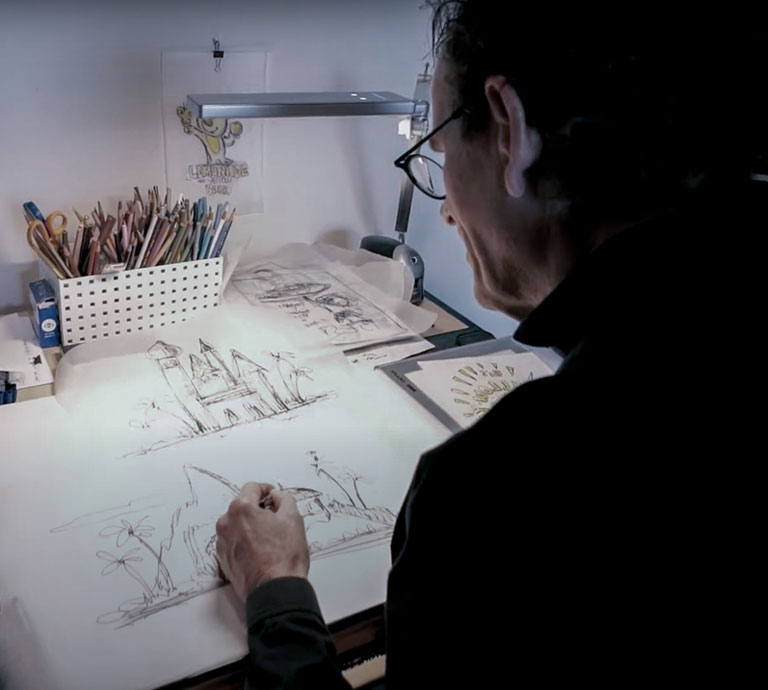 Joe Lanzisero drawing sketch artwork at his desk